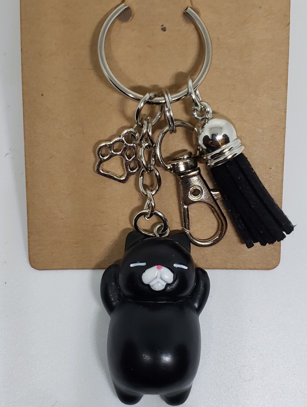 Handmade painted resin black cat paw keychain